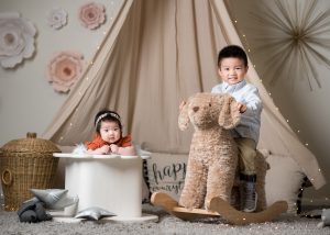 Amelia and Haeun cute siblings photoshoot at Chicago Baby Photo Studio
